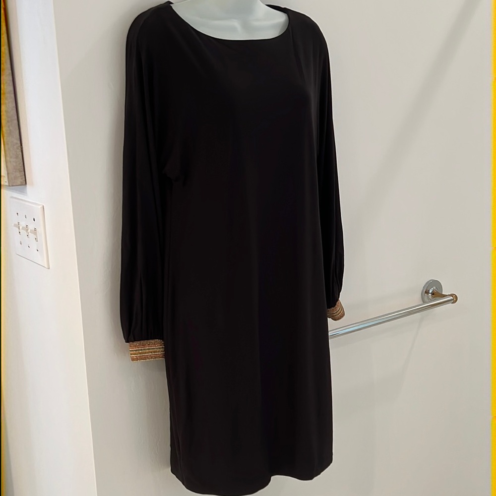 Trina Turk black long sleeve dress with gold cuffs